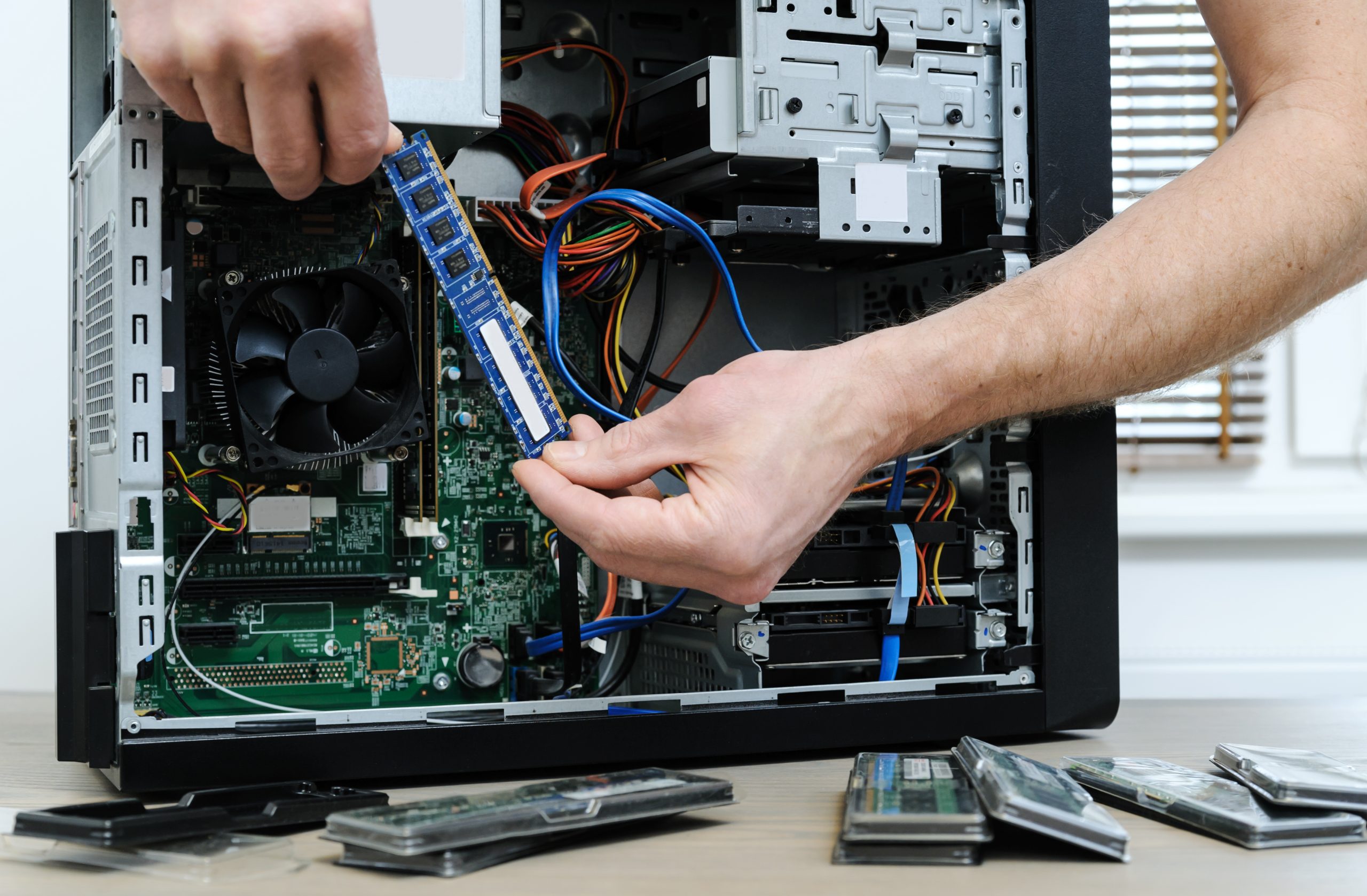 A man with a computer.